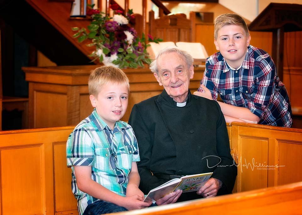 Rev William McMillan talks to Sunday School children at Dromore NSP Church